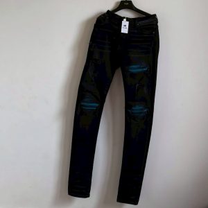 Amiri 破壞拼皮牛仔褲
