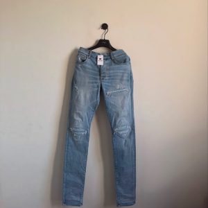 Amiri 破壞拼皮牛仔褲
