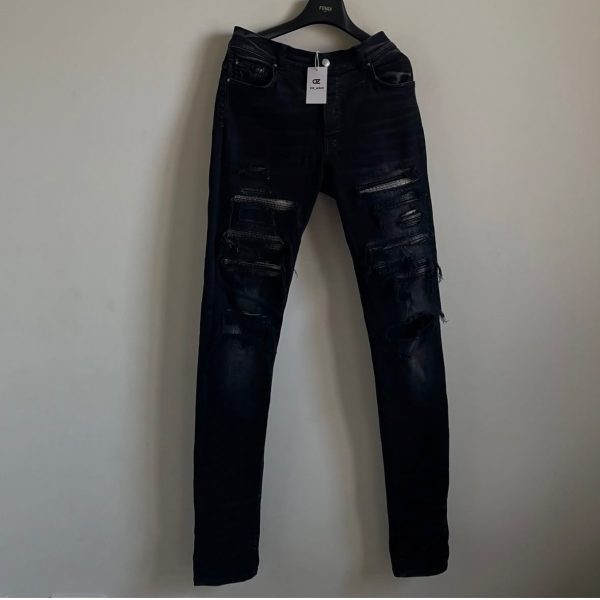 Amiri 破壞拼皮牛仔褲